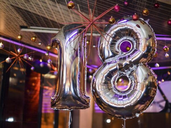 Vibrant balloons decorating an 18th birthday party, creating a festive and joyful atmosphere.